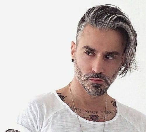 sexy man with tattoos, beard and a grey hair