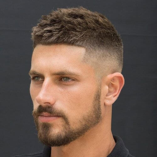 man with comb forward high and tight