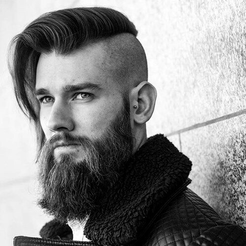 man with beard and a high and tight haircut