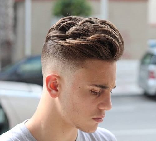 boy with high and tight wavy haircut