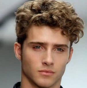 curly haired dude