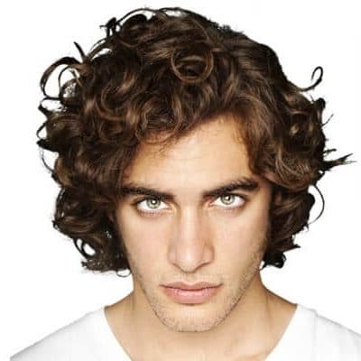 Guy with thick curly hair