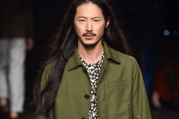 asian man with long hair