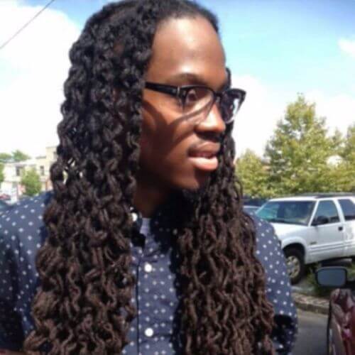 man with glasses - dreadlock styles for men