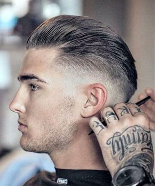 The Slick Back Haircut with Low Fade