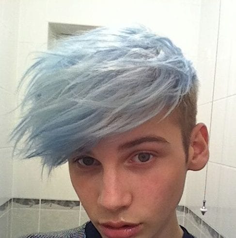 A man with his pastel blue layered haircuts