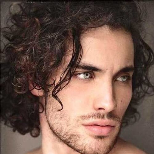 medium curly shaggy hairstyles for men
