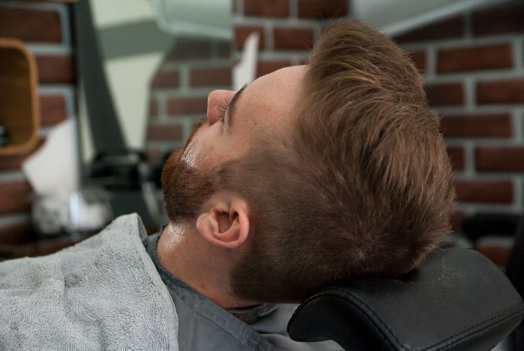 man getting a haircut