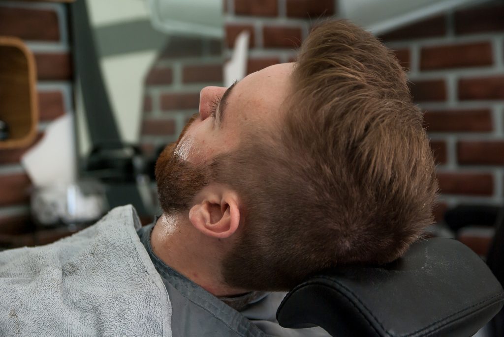 man getting a haircut