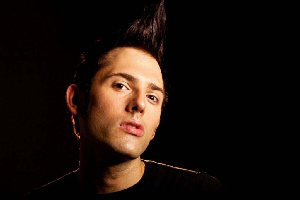 Angry young punk rocker with Faux Hawk.
