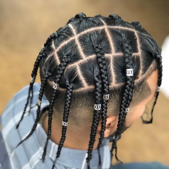 braids for men with metallic hair accessories