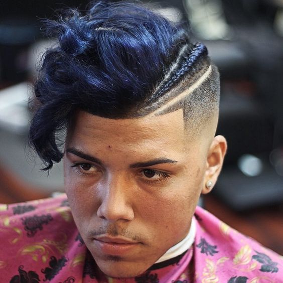 braids for men with aggressive undercut and blue highlights