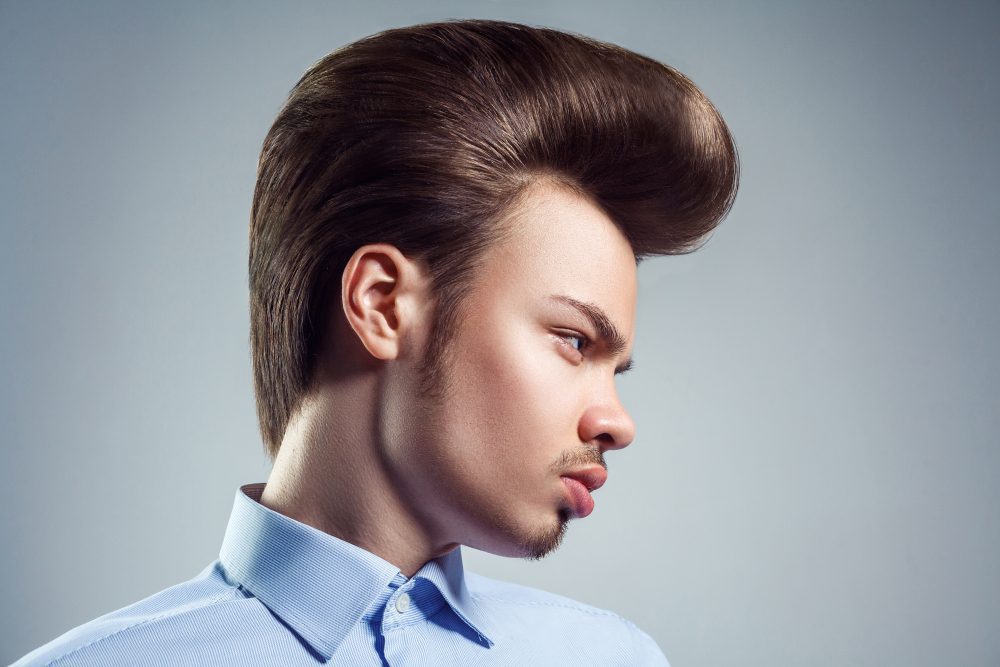 young man with retro classic pompadour hairstyle