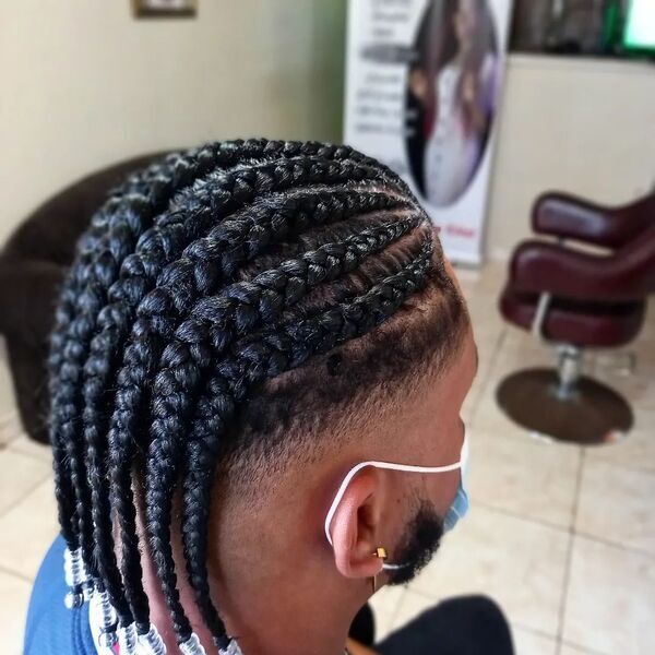 Afrohair Cornrow Braidstyle - a man had his afrohair braids with beads