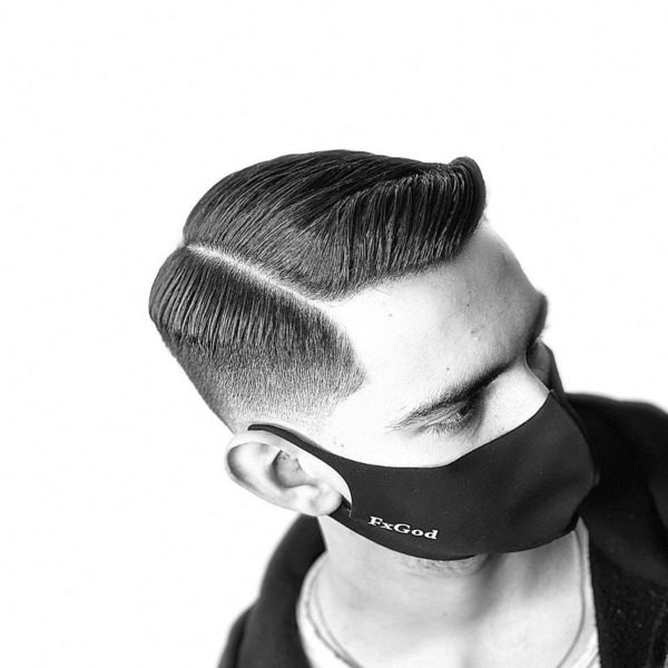 FadeGame 2Row Haircut - a man wearing a black mask