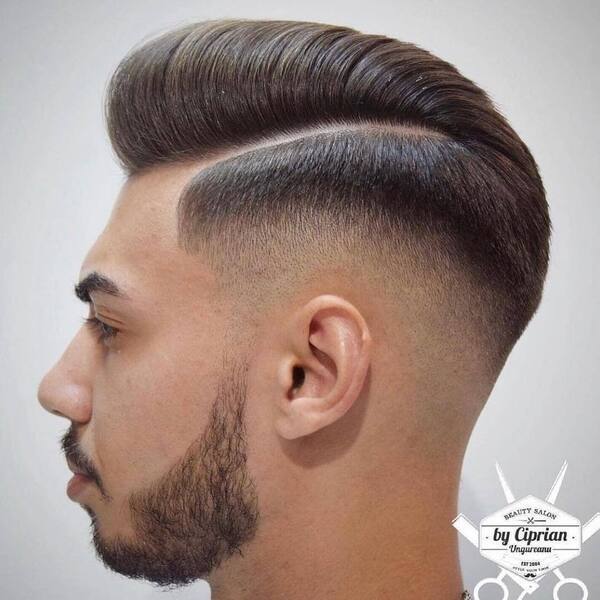 High Volume Hairstyle - a man had his High Volume Hairstyle with beard