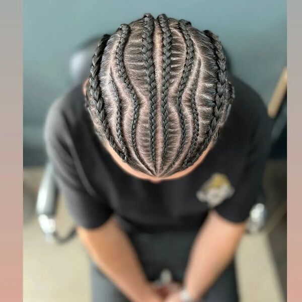 Impletit Cornrow for Men - a man had his impketit hairstyle with afro