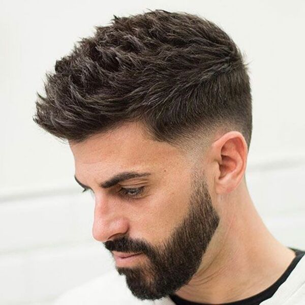 Low Fade French Crop - a man had his Low Fade French Crop with beard