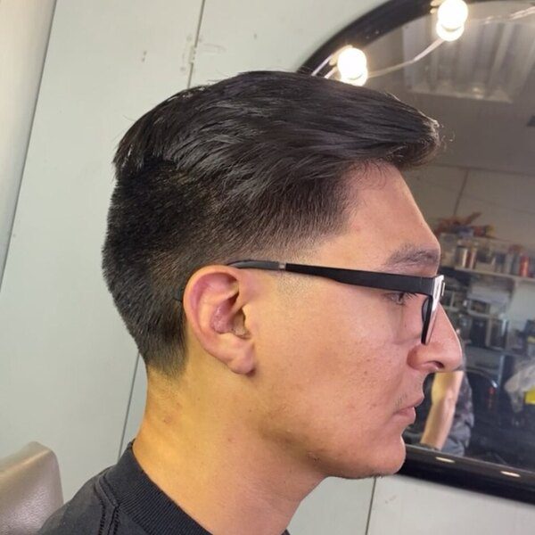 Mid Fade Comb Over Taper Haircuts for Men - a man had his Mid Fade Taper with glasses