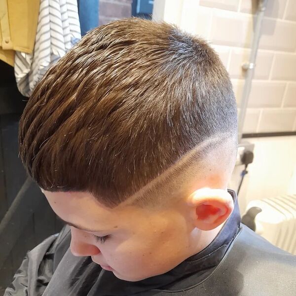 a boy had his Mid Skin Fade with Line with shirt french crop haircuts