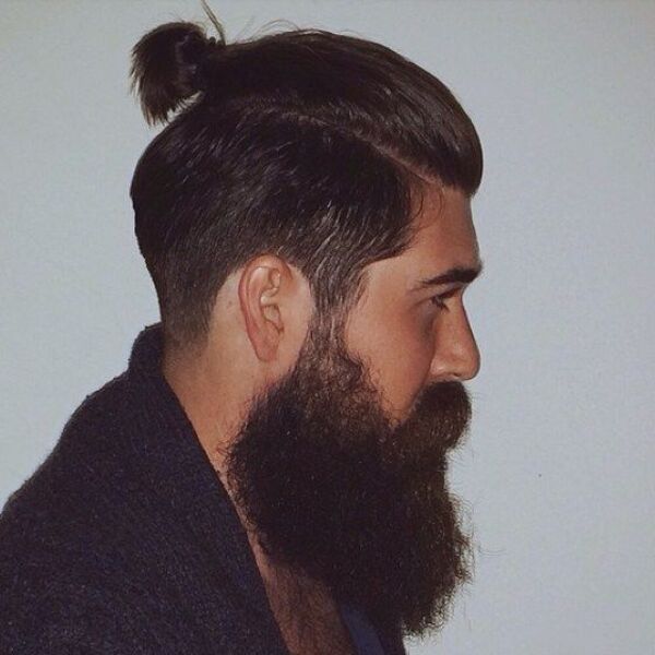 Mohawk Ponytail with Beard - a man had his hairstyle