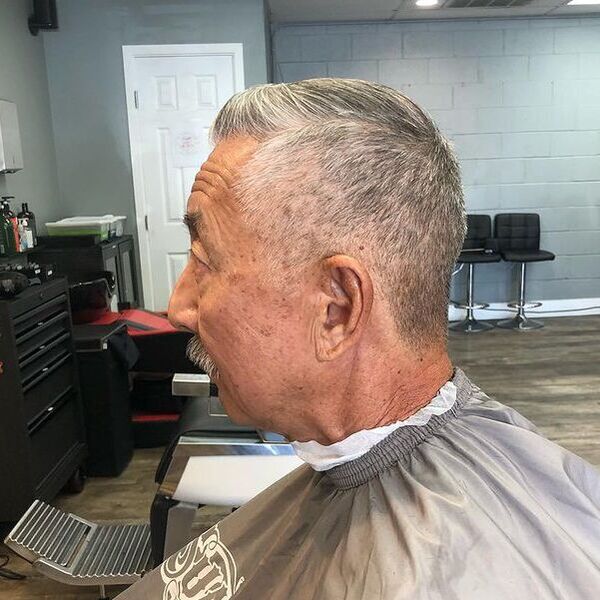 Old Man Comb Over Taper Haircuts for Men - a man had his Old Man Taper Combover with beard