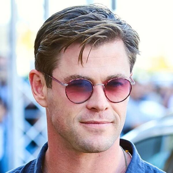 Side Sweep Chris Hemsworth Haircuts -a man had his hairstyle with glasses