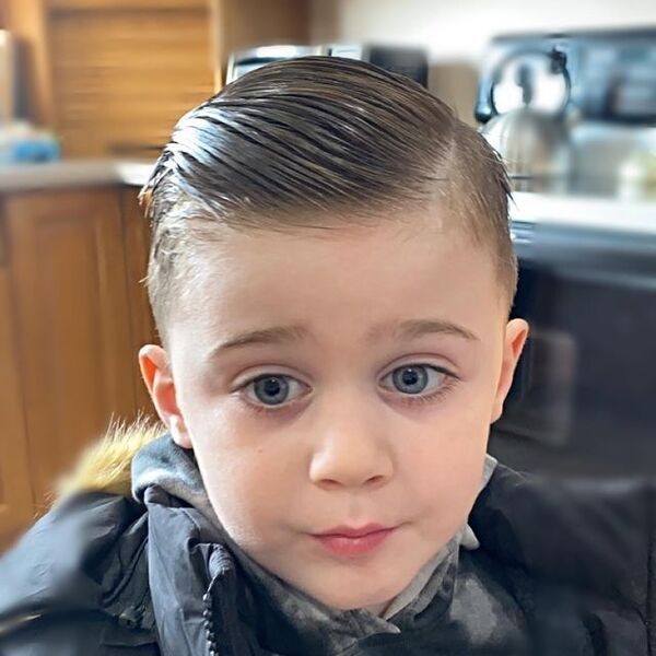 Slick Combover Toddler Boy Haircuts -A boy had his Slick Combover Cut wearing coat