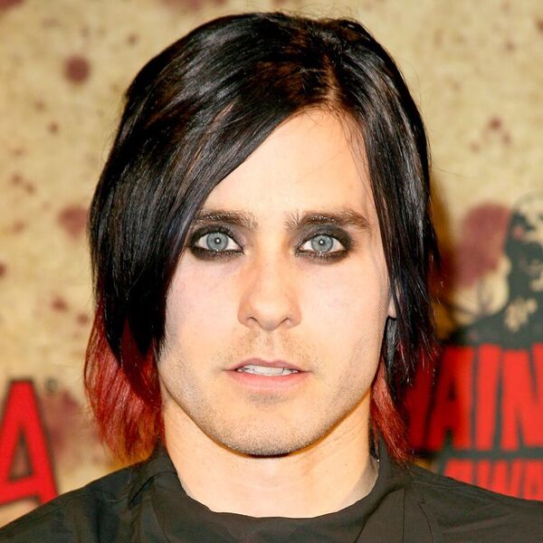 Emo Bangs with Side Part- Jared Leto wearing a black barber's cape