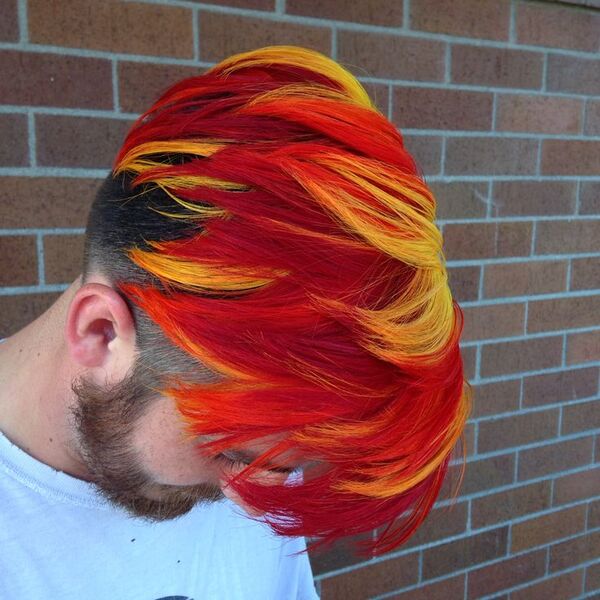 Intense Flamed Color Side Undercut- a man wearing a white shirt Crazy Haircuts