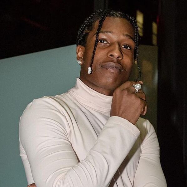 Side Braids with White Beads- Asap Rocky wearing a white turtle neck