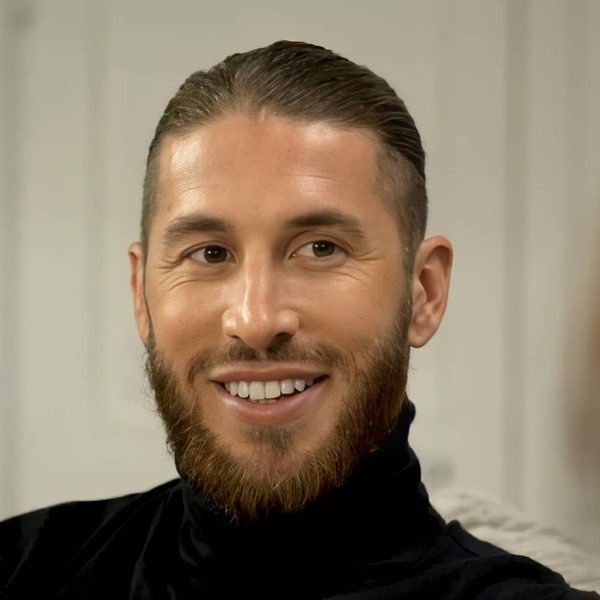 Slicked Back with Faded Undercut and Beard- Sergio Ramos wearing a black turtle neck shirt