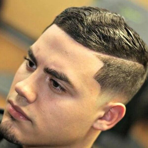a close up look of a man with mexican haircuts